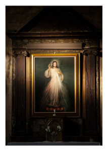 Divine Mercy painting of Jesus in a church altar