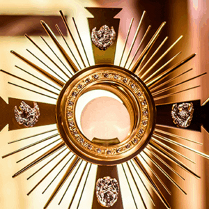 Golden monstrance with the Blessed Sacrament exposed for adoration