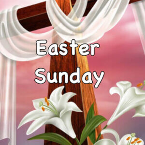 Cross draped in white cloth with Easter lilies and sunrise sky
