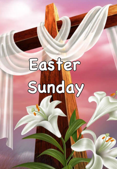Cross draped in white cloth with Easter lilies and sunrise sky