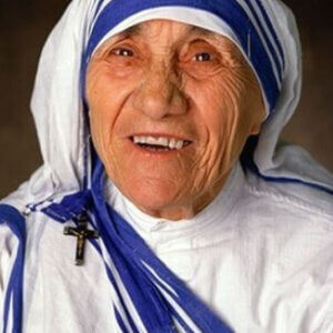 Portrait of St. Teresa of Calcutta in white and blue habit smiling