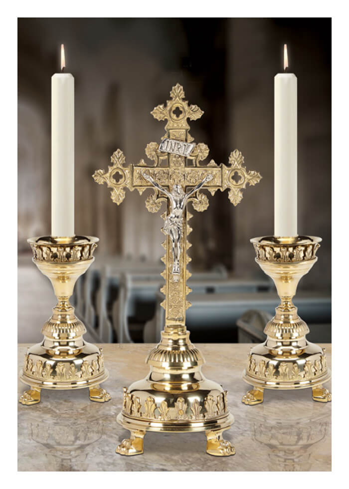 Golden crucifix with two candlesticks on altar